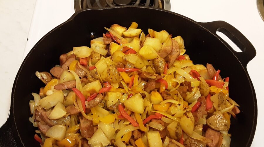 Potatoes and sausage with onions and bell peppers